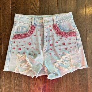 Boutique pink rhinestone, light washed denim cut-off shorts
